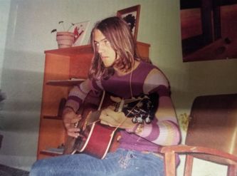 Composing a song, at 16, for his then girl friend Claire.