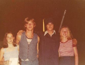 Phil with his then girl friend Rose, her brother and little sister at his high school graduation.